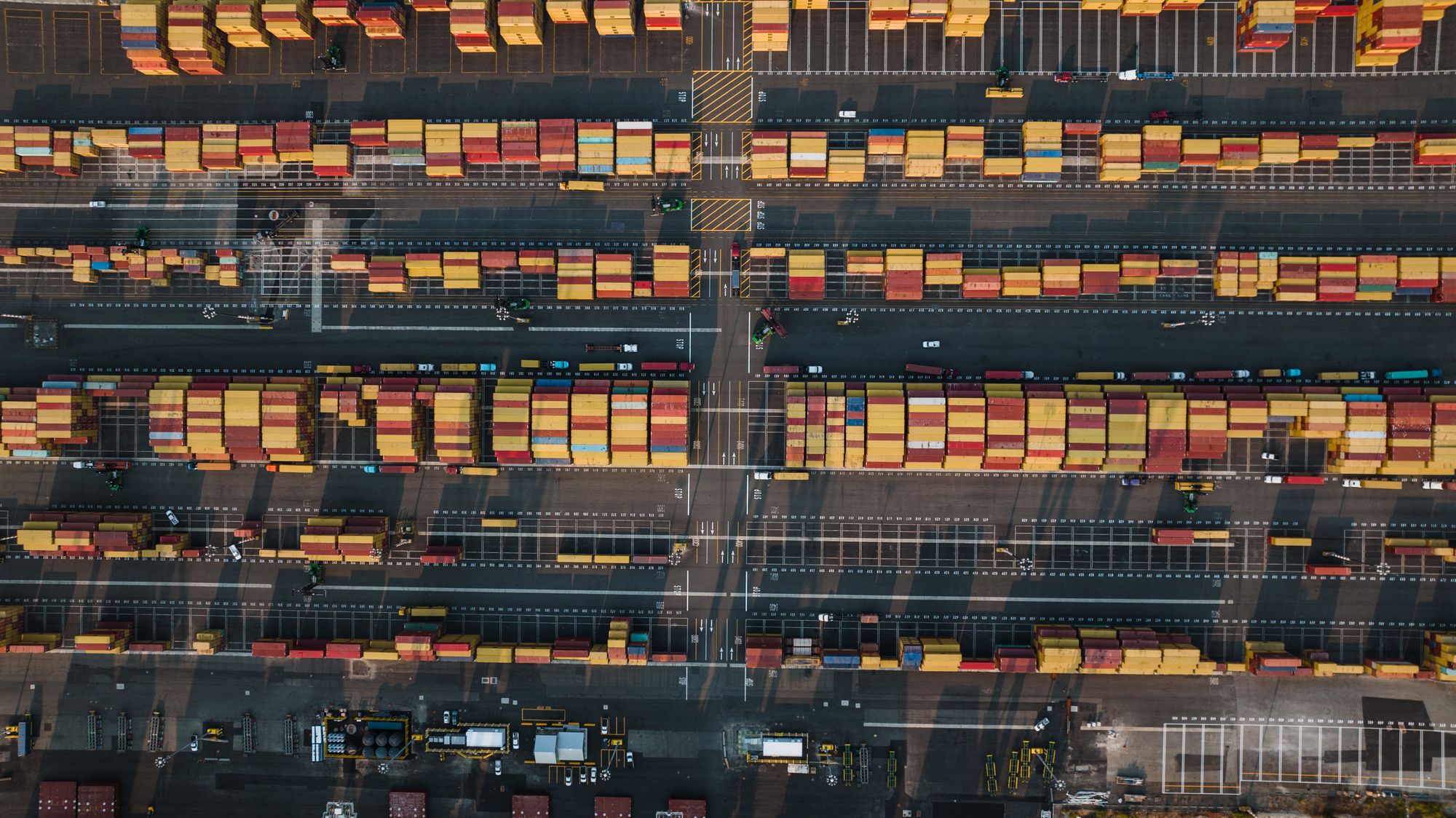 Shipping containers stacked at a port terminal